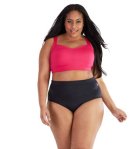 Plus size woman facing front wearing pink JunoActive swim bra top and black swim brief.